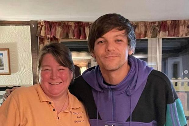 Bury Times: One Direction's Louis Tomlinson with landlady of The Woolpack, Dee Liberty-Spark
