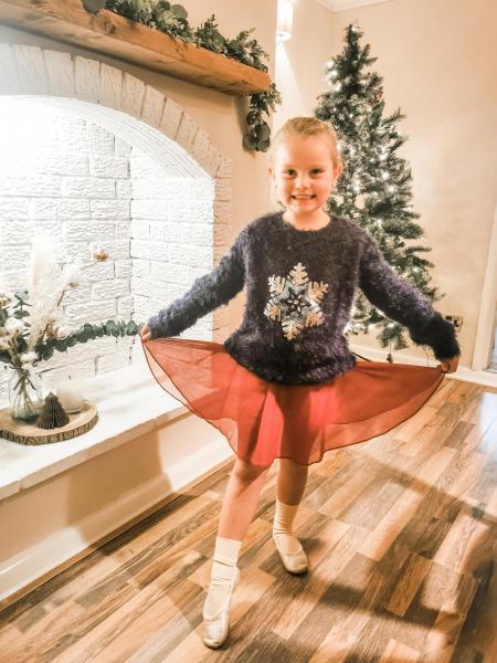SUPPORT: Sophia Coluccio, a young ballerina wearing her Christmas jumper for her ballet class, raising money for Bleakholt Animal Sanctuary