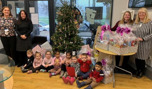 GIFTS: The festive donations from Financial Options Group for Hoyles Nursery
