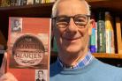 Bill Rogers with his new book, The Powell Diaries