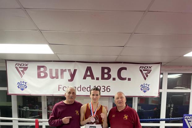 FINALS APPEARANCE: Bury ABC's Ella Thompstone, centre, with her coaches