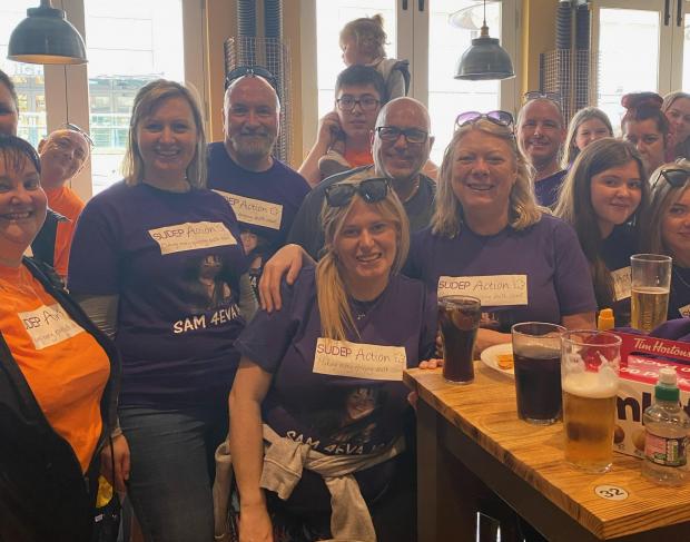 Bury Times: The walkers ended the event at the Crown and Anchor pub, Manchester. Photo: Lynn Mcgoff
