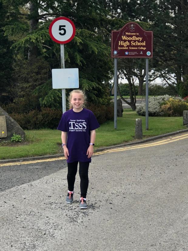 Bury Times: Lily outside her school in Ramsbottom 