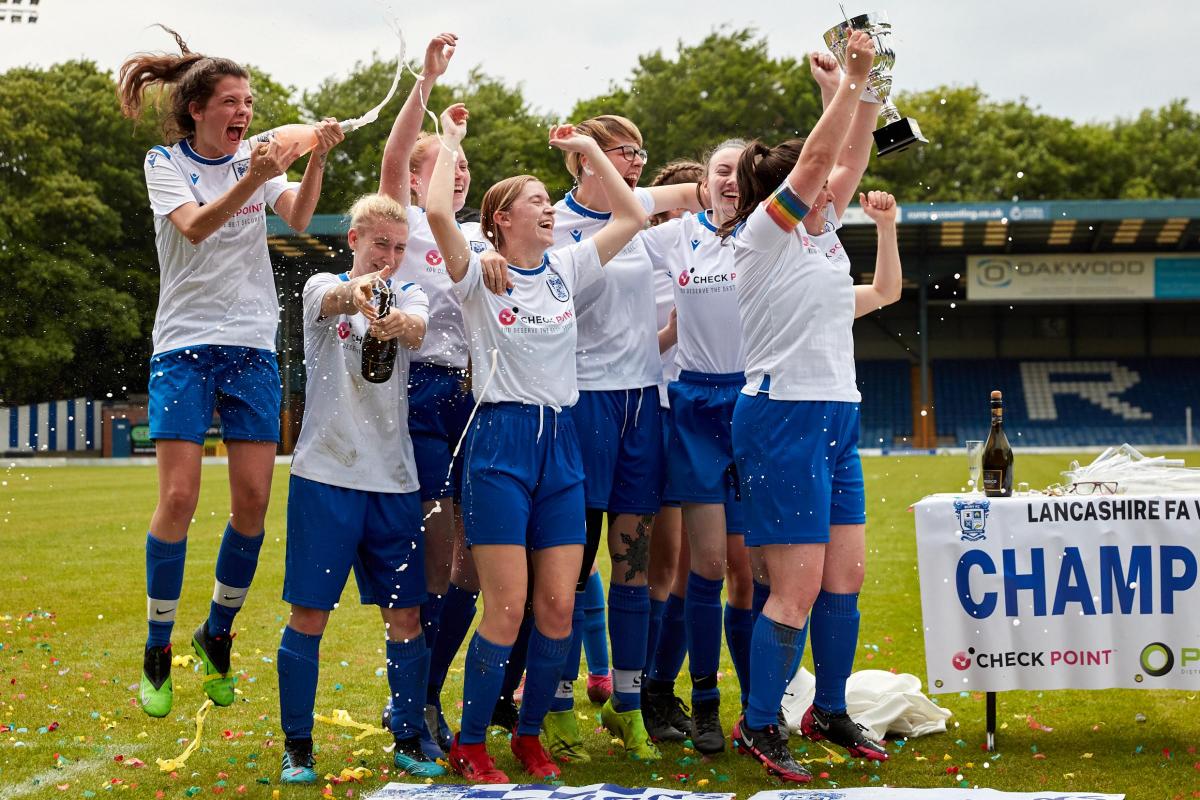 Bury FC Women celebrate league victory in front of record-breaking crowd. of Martin Stembridge and Alistair Rowe