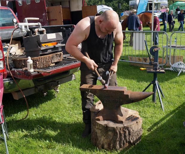 Bury Times: Blacksmiths will be competition in the farrier competition at this year's show