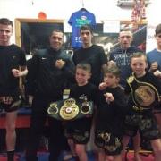 Scott Quigg with fighters from GFC Muay Thai in 2014, the club where his career started at the age of 10