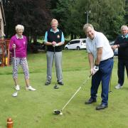 Mike Fitzpatrick on the first tee at the revamped Prestwich Golf Club watched by Barbara Elliott, Derek Hopkins and Pete Howard