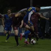 Bury AFC and Radcliffe battle for the ball on Tuesday night. Picture: Haydan Roberts