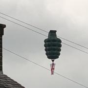 A grenade-shaped balloon which was spotted over Bury