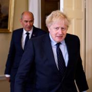 Britain’s Prime Minister Boris Johnson, right (Tolga Akmen/PA)