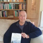 Author Steve Dunn with his book, The Power and the Glory
