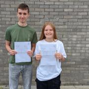 Students Luke Kneale and Nina Jones show off their results.
