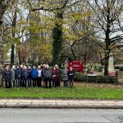 Residents and councillors next to Whitefield Cenotaph