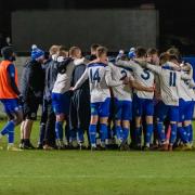 UNITY: Bury AFC players celebrate their 1-0 win against Charnock Richard on Tuesday night Picture: Phil Hill