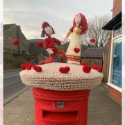 The Valentine's Day postbox topper in Holcombe Brook