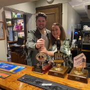 Cllr Liam James Dean and Lisa Moore behind the bar at the launch of the Hamers Arms event last month