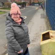 Jessica Coop, 30, hides books at Tottington Primary School