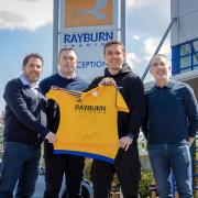 From left; Howard Goldman, managing director of Rayburn Trading, buyer Joe Keane, Gary Neville and buying director Russell Goldman