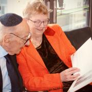 Professor Peter Mittler CBE and his wife Penny reading his My Voice book
