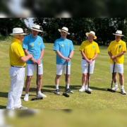 Club chairman Roy Spencer explains the rudiments of croquet
