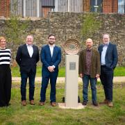 Claire Trevett, Katie Dyson and Chris Heath of Cube Homes with Bury South MP Christian Wakeford, artist David Tragen, Matthew Harrison, chief executive of Great Places and Cube’s Jamie Chitticks