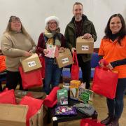 Trust House was one of the organisations to have distributed the packs. Katie Jenkinson, right, makes up the packs with Joanne Smith (from public health), Jane Straccia (former Six Town Housing) and Bury's director of public health, Jon Hobday
