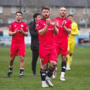 Radcliffe players applaud fans at full time after defeat at Guiseley Picture: Barkley Costello