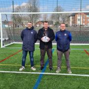Paul Hilton of Radcliffe Football Foundation, Cllr Alan Quinn and Lee Chapman of Radcliffe Football Foundation