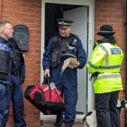 Police conduct a search of a house in Bury for Operation Avro