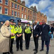 James Cleverly with police officers