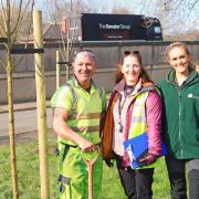 Planting new trees on the Chesham estate are (from left) Gary from Landscape Engineering, Fiona Hill, home energy manager and Abbie Saul from City of Trees