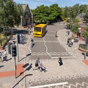A CGI showing proposed improved crossing, pavements and bus route in Heywood town centre (Picture: TfGM)