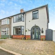 An impressive four-bedroom home on up for sale in Walmersley