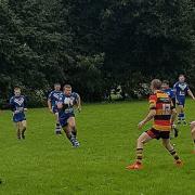 Bury Broncos attempt to make inroads in the Pilkington Recs defence in their narrow 13-10 defeat on Saturday