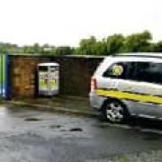 NO GO: Bollards across the entrance to the school and a security van outside Derby High after the swine flu outbreak