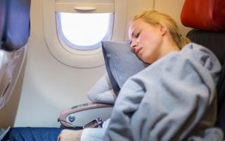 Have you ever fallen asleep on a flight? You might be doing it all wrong - a sleep posture expert has shared how you should sleep when on a flight