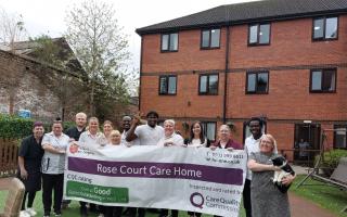 Rose Court care home celebrating their inspection report