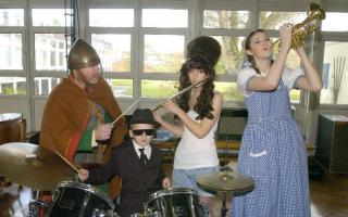 STAR FUNDRAISERS: Lawrence Yates as an Anglo-Saxon conductor, Joe Kilroy as a Blues Brother, Chloe Forrester as Amy Winehouse and Sarah Leach as Dorothy, from the Wizard of Oz