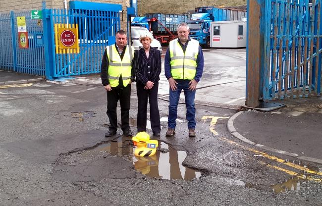 Peter Allen Director, Councillor Dorothy Gunther, John Allen (Jnr) Director near the pothole ISM Waste Recycling in Ramsbottom.